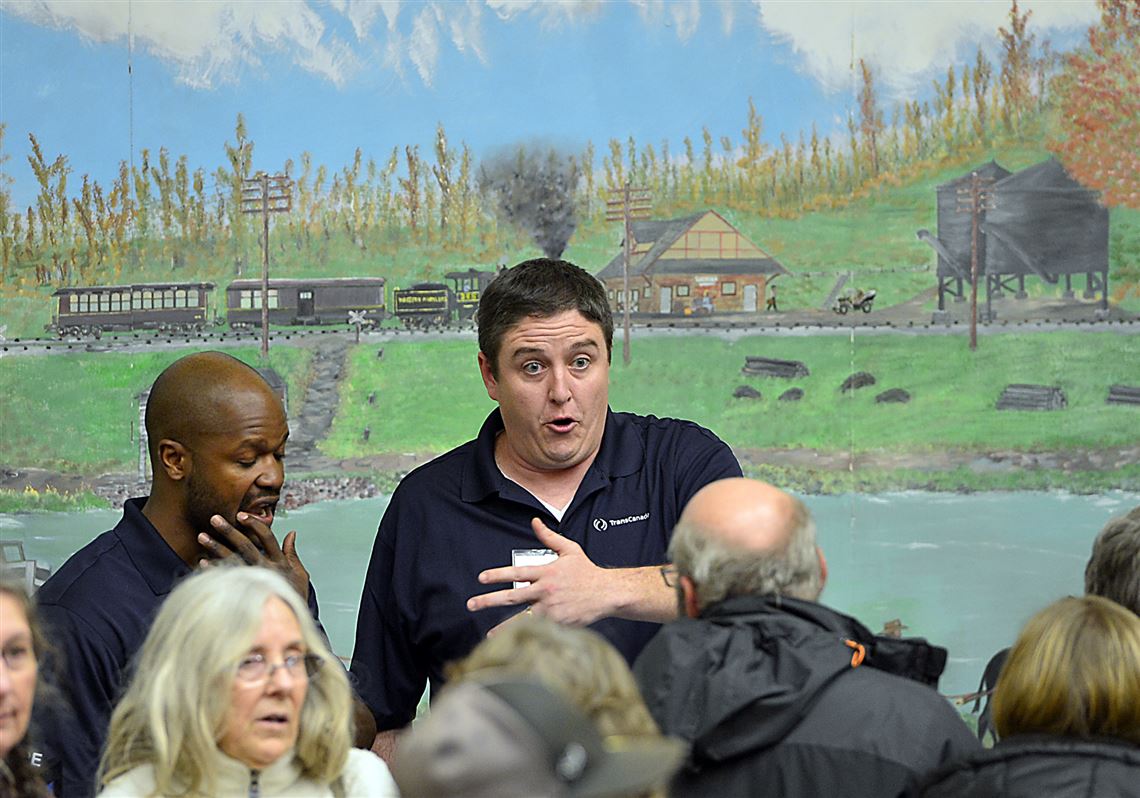 Jason Hamil, a project management worker, answers citizen questions during a TransCanada open house to explain a proposed gas pipeline beneath the Potomac River, Thursday, Feb. 9, 2017. A Potomac River protection group organized a demonstration against plans for a pipeline beneath the river that would carry natural gas from Pennsylvania to West Virginia. (Kevin G. Gilbert/The Herald-Mail via AP)