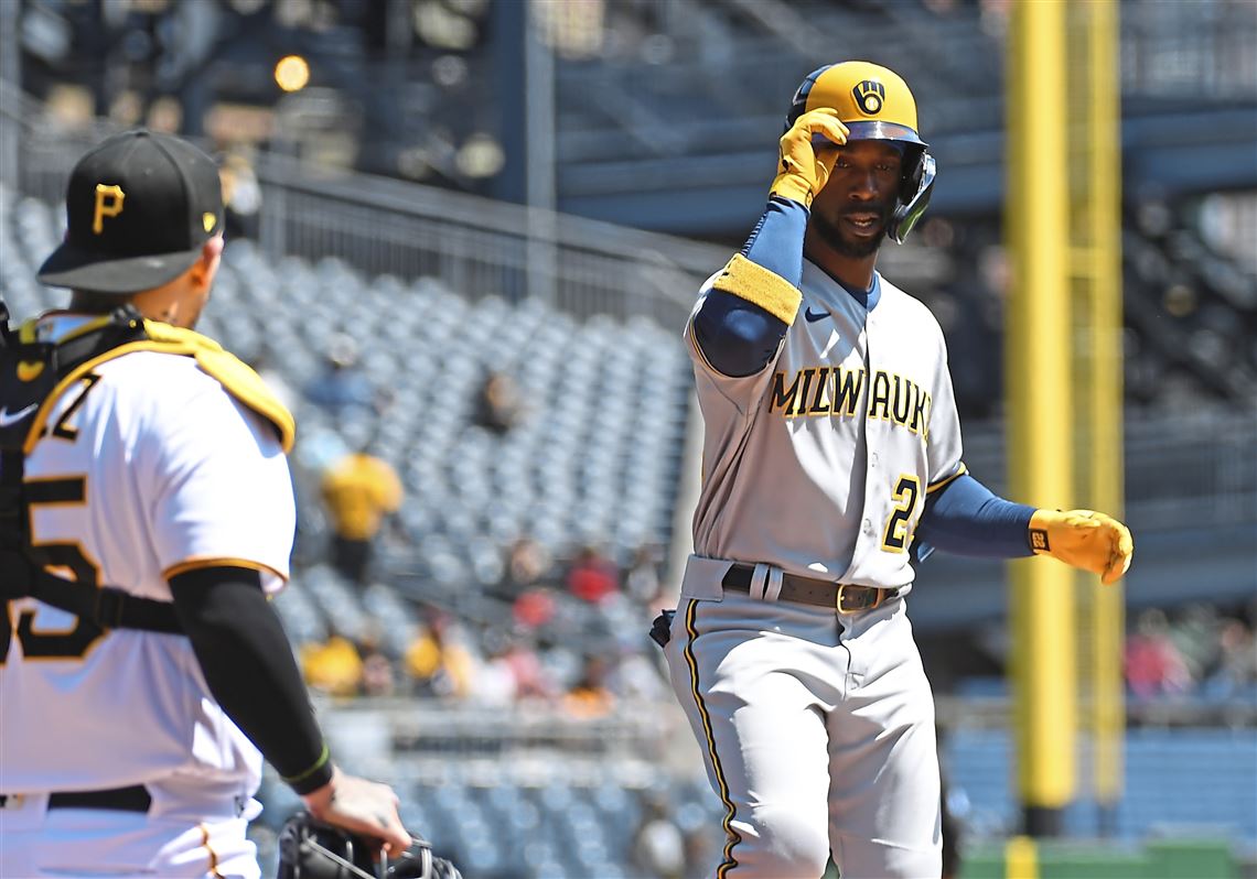 Milwaukee Brewers left fielder Andrew McCutchen catches for an out