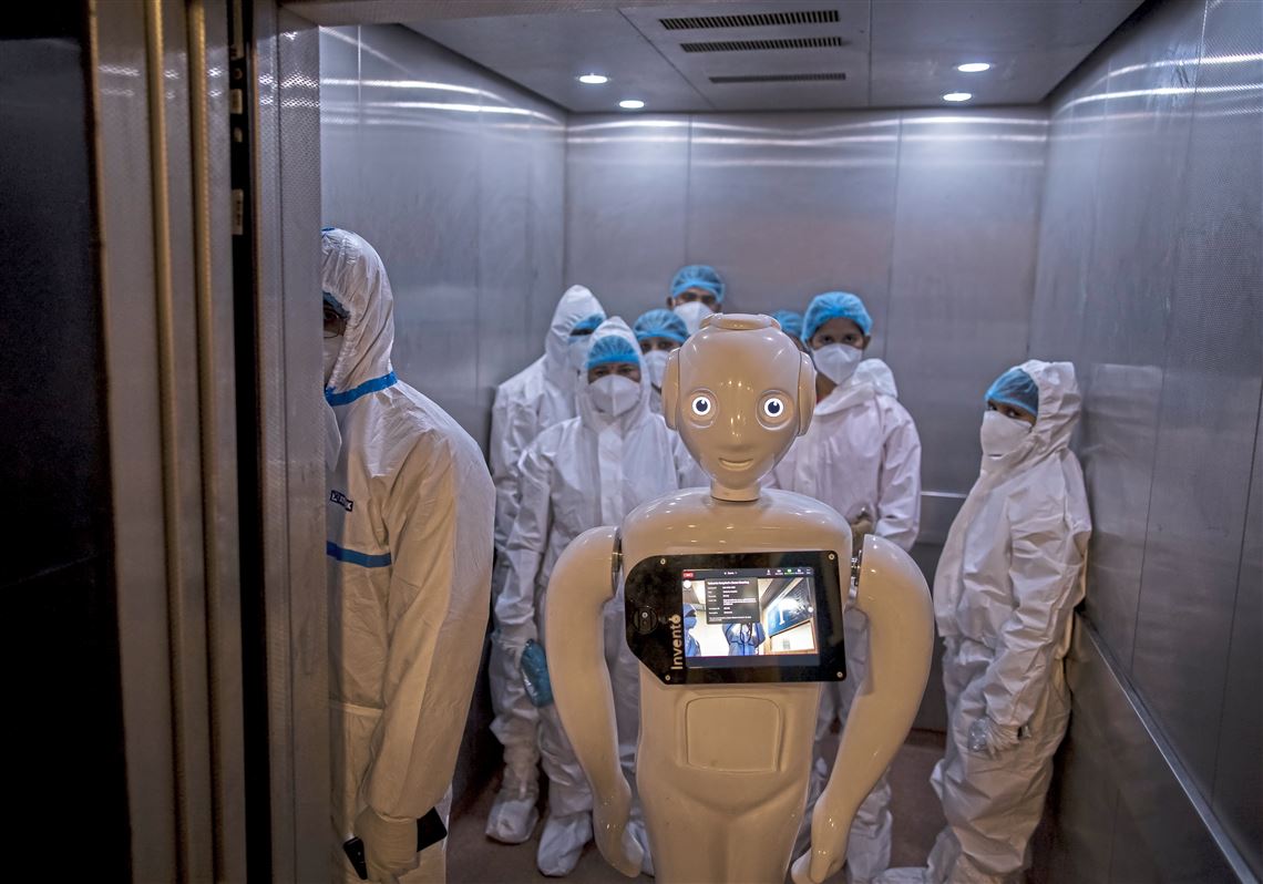 A robot used to assist Covid-19 patients is seen in an elevator on December 5, 2020 in New Delhi, India. (Anindito Mukherjee/Getty Images)