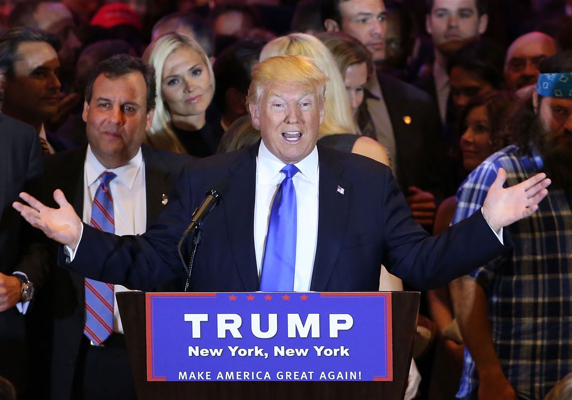 Republican presidential candidate Donald Trump  speaks to supporters and the media with New Jersey Governor Chris Christie behind him at Trump Towers following the conclusion of primaries Tuesday.