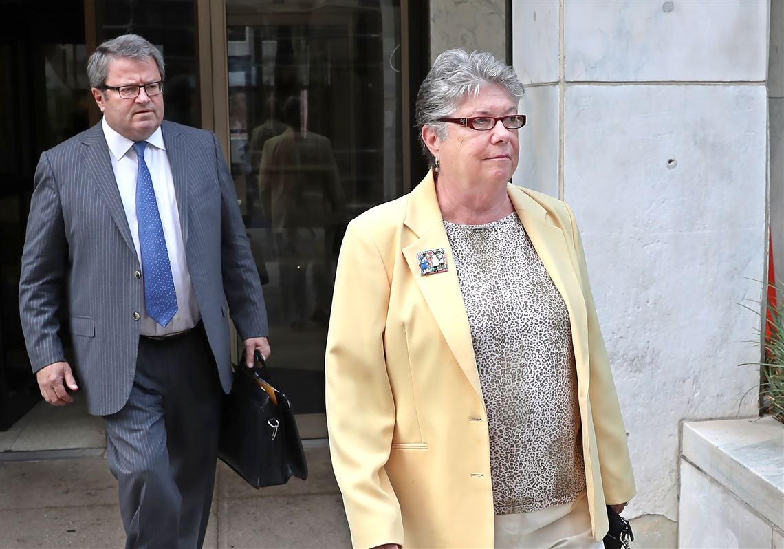 Former PA Treasurer Barbara Hafer, right, and her attorney, John Knorr, left, leave the Harrisburg Federal Court Building on August 1, 2016