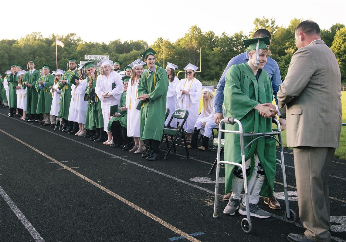 Walking tall: Hayden Hamilton, paralyzed in a WPIAL football game three  years ago, walks at graduation | Pittsburgh Post-Gazette