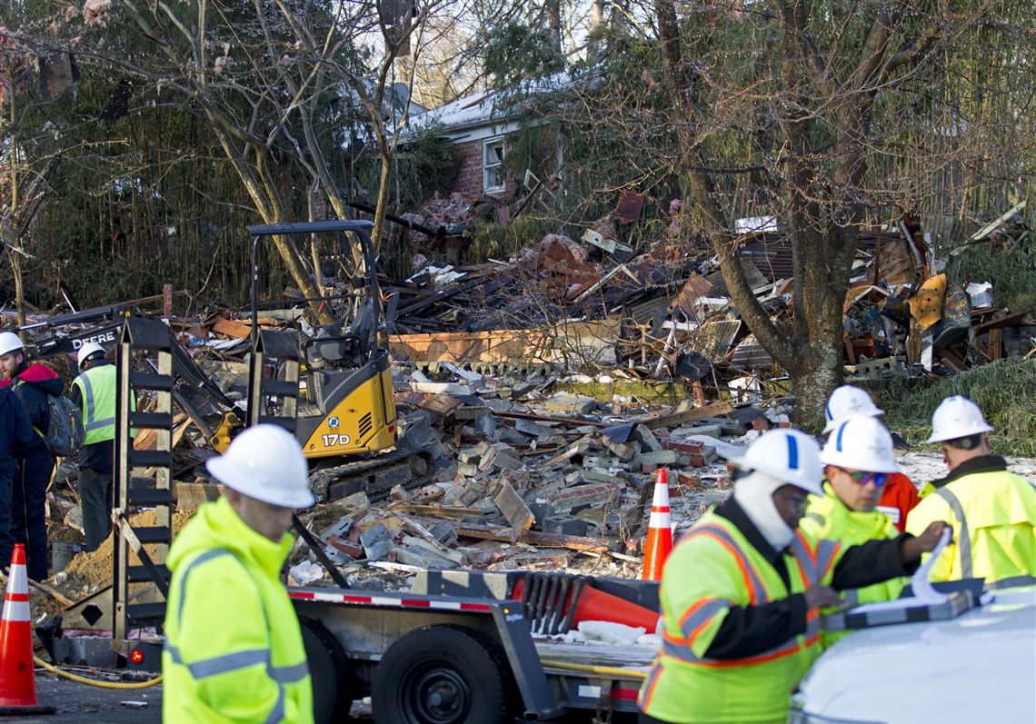 In this photo provided by the Montgomery County fire & Rescue Service, emergency personnel work at the scene of a leveled house in Rockville, Md., Friday, March 17, 2017. Authorities said the explosion occurred about 1 a.m. Friday and reduced the home to a 