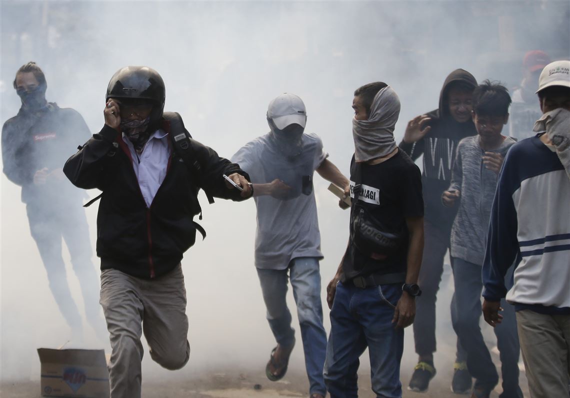 World Briefs: Indonesian Police Fire Tear Gas, Water Cannons As ...