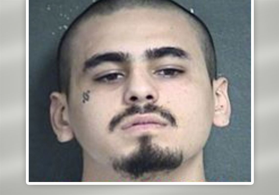 1 suspect in custody, another at large after mass shooting at Kansas