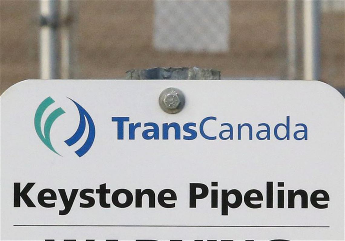 FILE- This Nov. 6, 2015, file photo shows a sign for TransCanada's Keystone pipeline facilities in Hardisty, Alberta, A Nebraska commission has approved an alternative Keystone XL route through the state, removing the last regulatory hurdle to the $8 billion oil pipeline project. The Nebraska Public Service Commission voted on the long-delayed project Monday, Nov. 20, 2017, though the decision could still be challenged in court.  (Jeff McIntosh/The Canadian Press via AP, File)