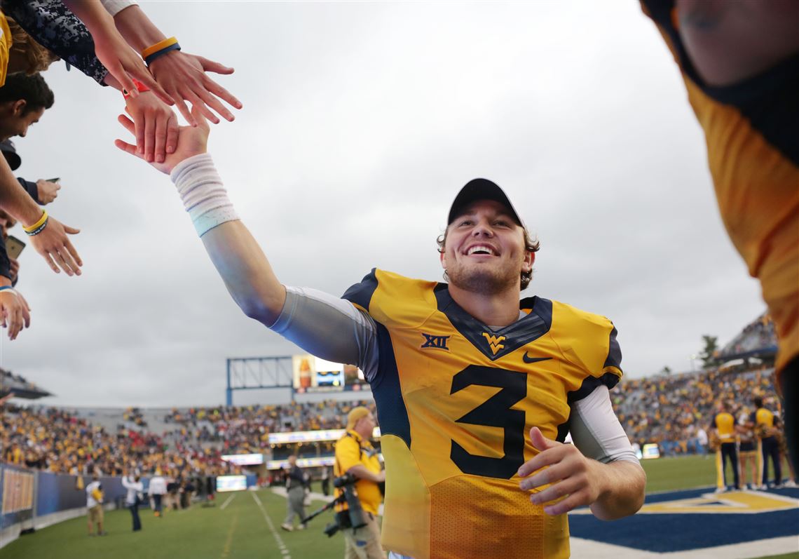Once overlooked, WVU QB Howard turns disappointment into determination