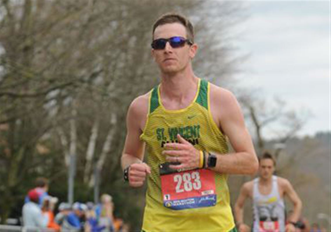 Saint Vincent running coach becomes internet sensation after helping distressed runner at Boston Marathon