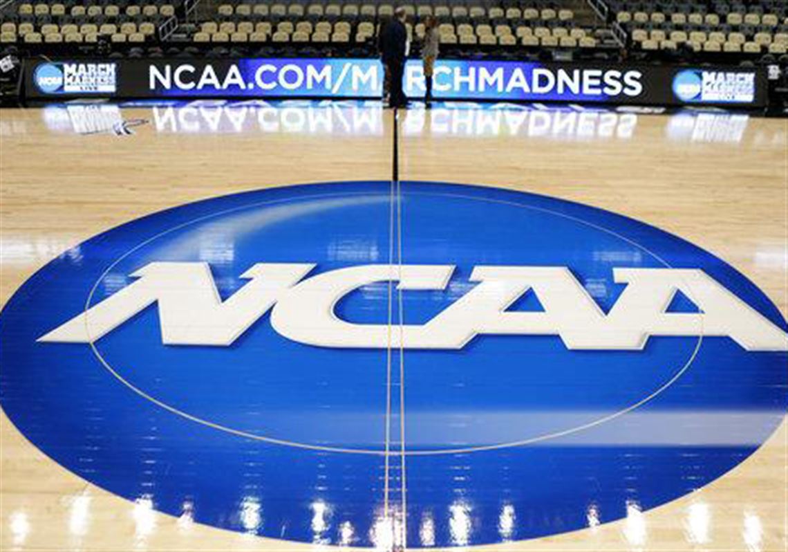 In this March 18, 2015, file photo, the NCAA logo is seen at center court of then-Consol Energy Centerin March 2015.