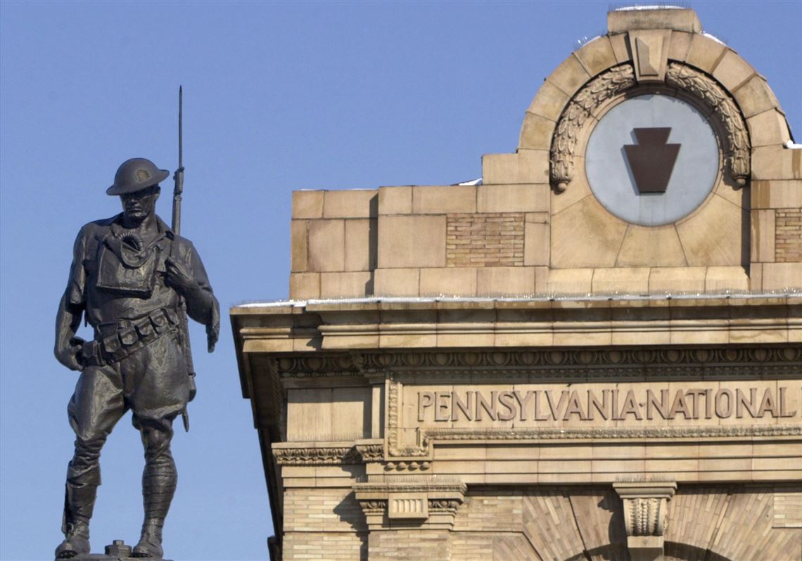 Sculptor Allen George Newman's World War I doughboy statue on the Sixth Ward Honor Roll memorial has been guarding the entrance to Lawrenceville at the intersection of Penn Ave. and Butler St. since 1919. 