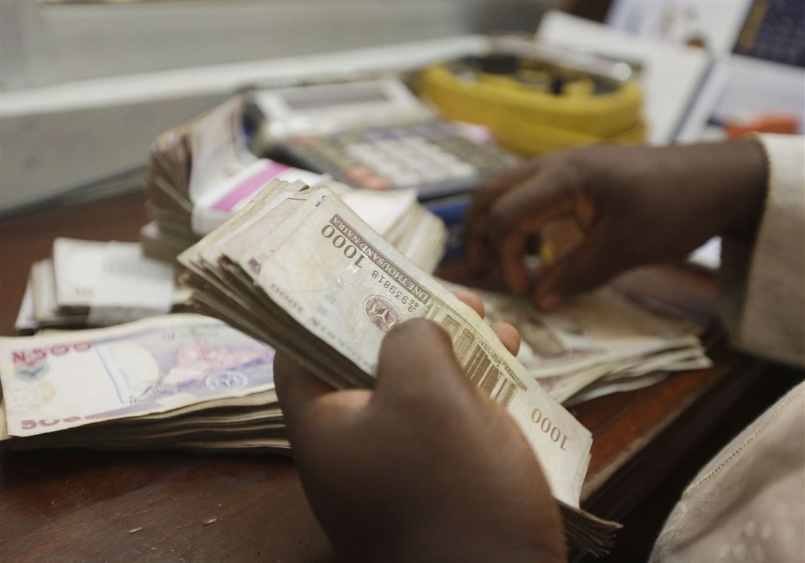 Nigeria S Currency Plummets As Naira Floats For 1st Time Pittsburgh Post Gazette