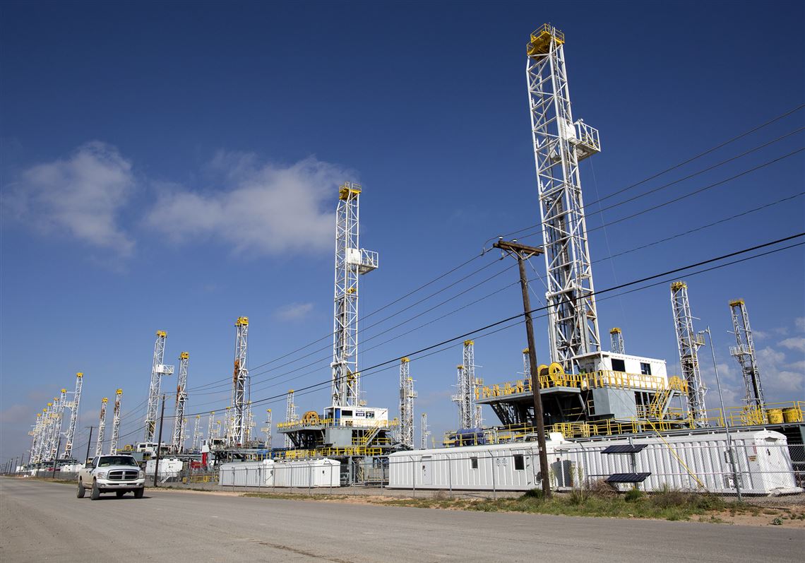 FILE - In this May 18, 2015, file photo, more than 30 oil drilling rigs stood idle in Odessa, Texas. Ken Medlock, director of an energy-studies program at Rice University in Houston, says an assessment Tuesday, Nov. 15, 2016 by the U.S. Geological Survey that the Wolfcamp Shale in the Midland-Odessa region could yield 20 billion barrels of oil is another sign that 