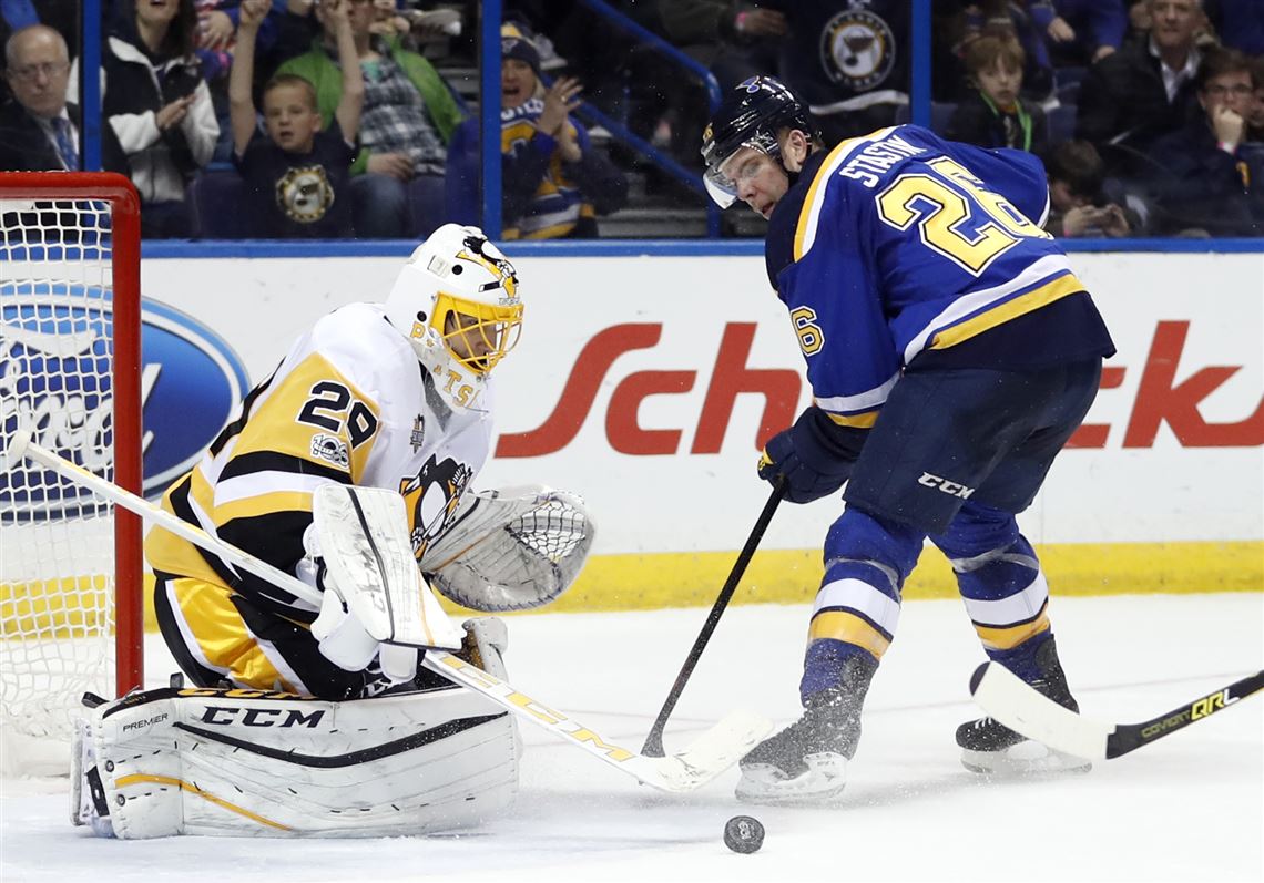 Pittsburgh Penguin goalie Marc-Andre Fleury blocks a shot in the