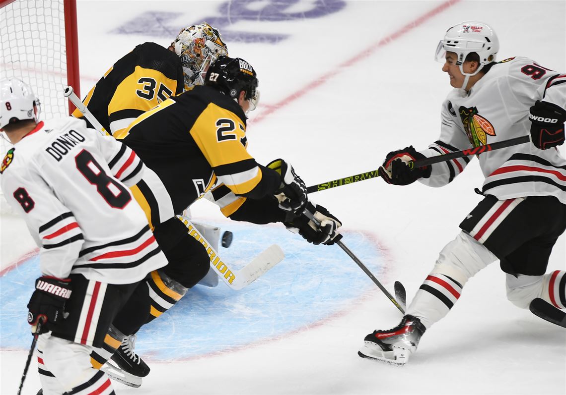 Connor Bedard picks up an assist in his NHL debut as the Blackhawks rally  past Crosby, Penguins 4-2