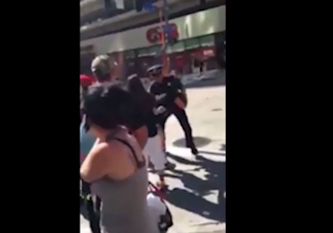 A police officer confronts a PrideFest attendee over the weekend in Pittsburgh in this frame from the video below.