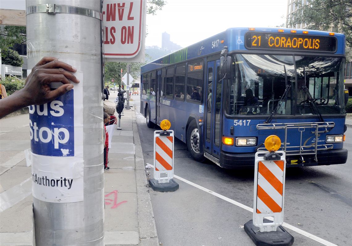 The No. 21 Coraopolis bus moves along Liberty Avenue, Downtown, during evening rush hour.