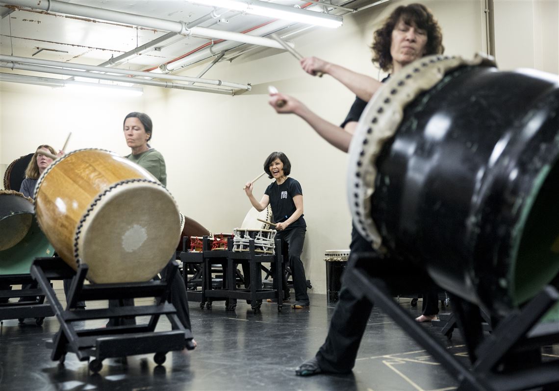 Iris Shiraishi, third from left, decided in her 60s to start her own Taiko, or Japanese drumming group, that she teachers at Mu Performing Arts Studio space in Minneapolis.