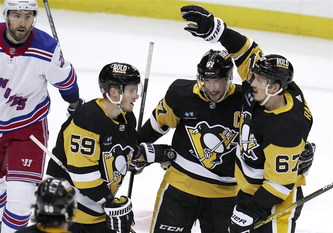 Letang scores two, leads Penguins in OT