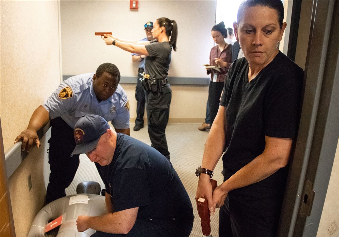 Officials Demonstrate Getting Into Warm Zones During Mass