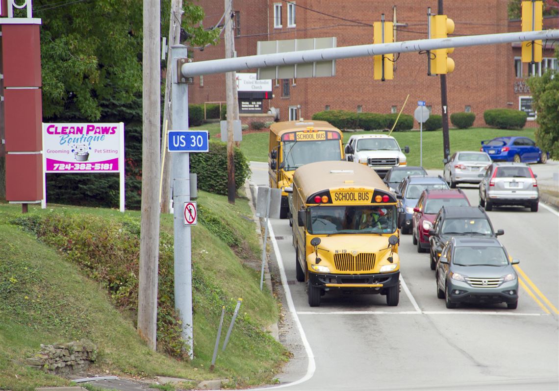 Traffic waits for a stop light at the Intersection of Route 30 and Robbins Station Road in North Huntingdon. Township officials are working with Carnegie Mellon to figure out ways to help maintain traffic flow during Route 30 construction. 