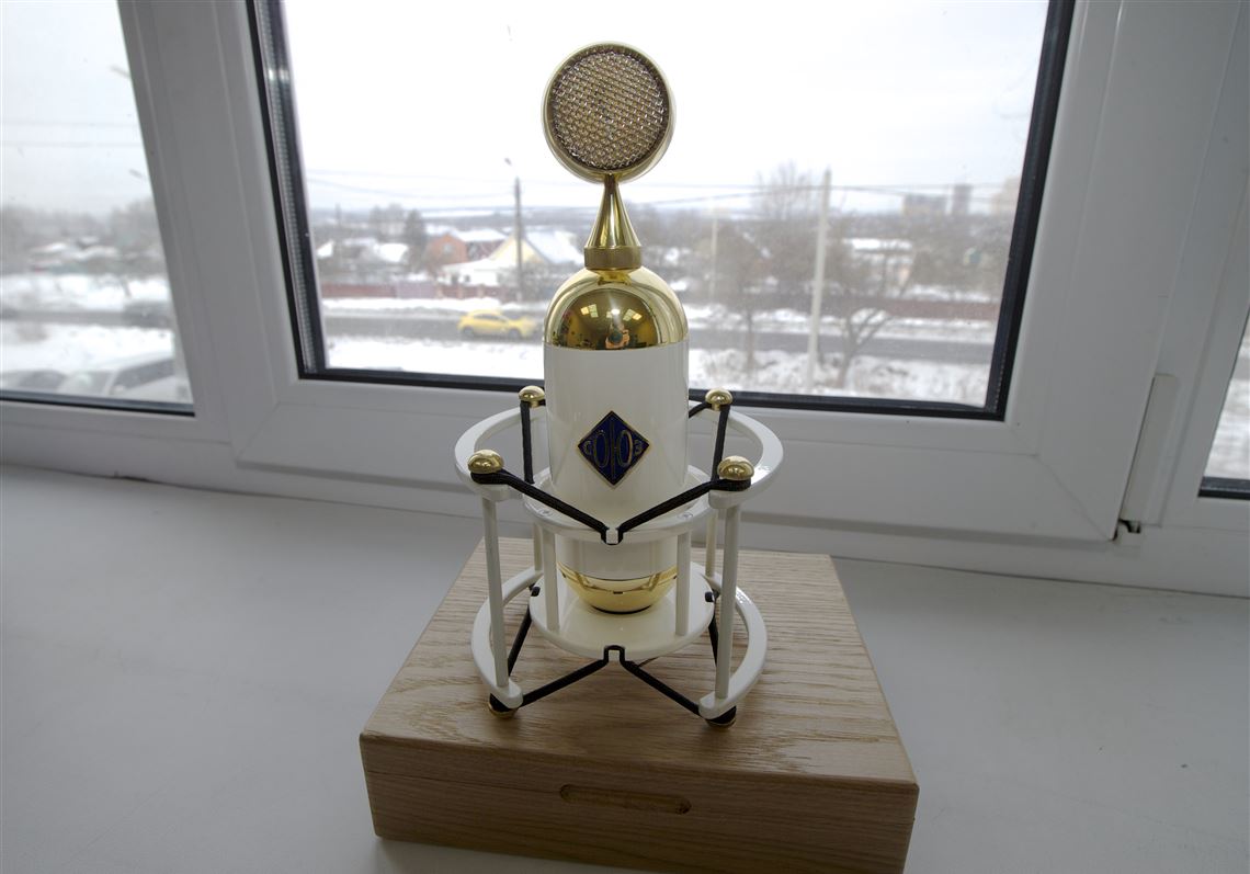 On this Thursday, Feb. 9, 2017 photo a Soyuz SU-017 microphone sits on a window at a factory in Tula, Russia. Californian musician David Brown and fan Pavel Bazdyrev are a rare example of success in Russiaâ€™s consumer goods industry. They have been making high-end microphones in Russia since 2014, taking advantage of cheap labor and second hand machinery from Kalashnikov arms plants. (AP Photo/Ivan Sekretarev)