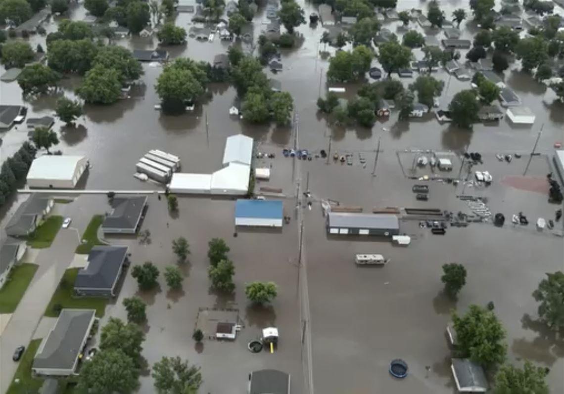 Flooding forces people from homes in some parts of Iowa while much of U ...