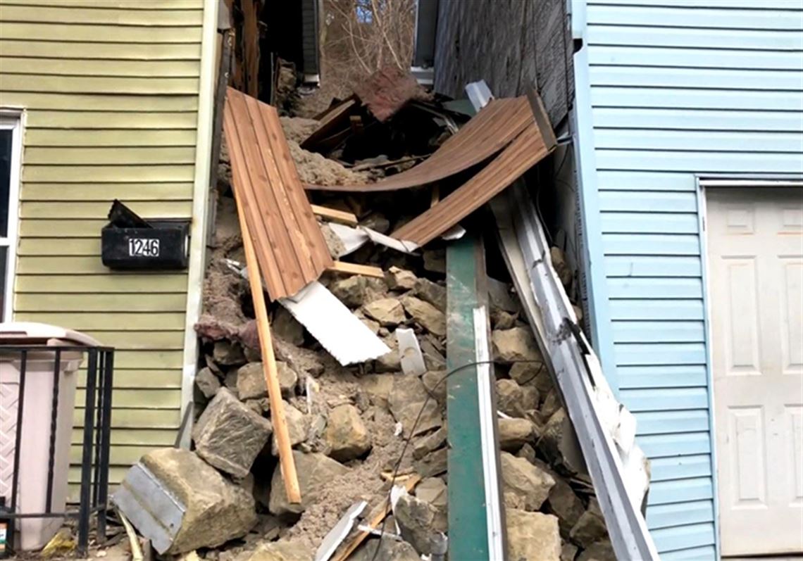 Condemned building collapses in Spring Garden