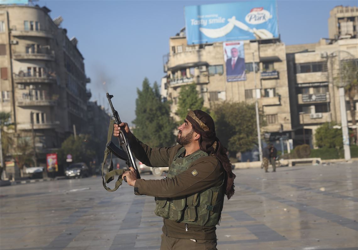 Syrian Insurgents Capture Hama in Major Setback for Assad