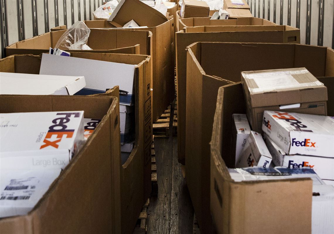 A shipment of H-1B visa petitions arrives this month at a government processing center in Laguna Niguel, Calif.