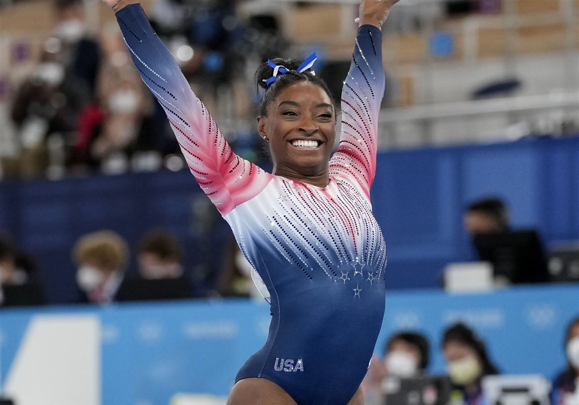 Simone Biles wins bronze on balance beam after returning to competition ...