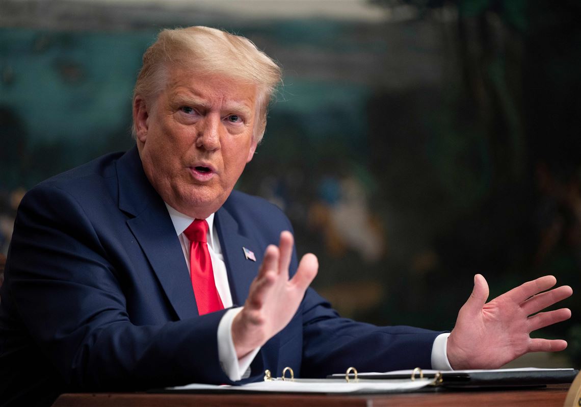 President Donald Trump speaks to reporters after participating in a Thanksgiving teleconference with members of the military, at the White House in Washington, DC, on November 26, 2020. 