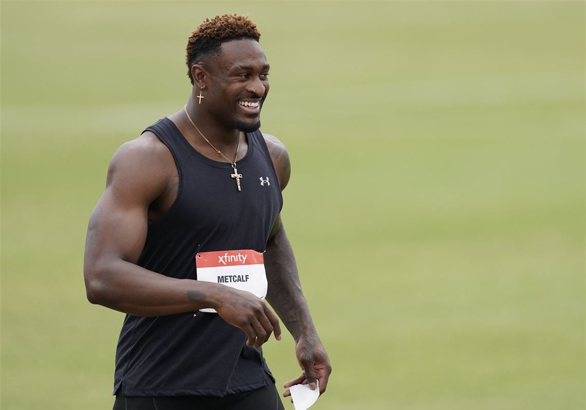 Finishing last in heat, DK Metcalf turns in respectable 100-meter time