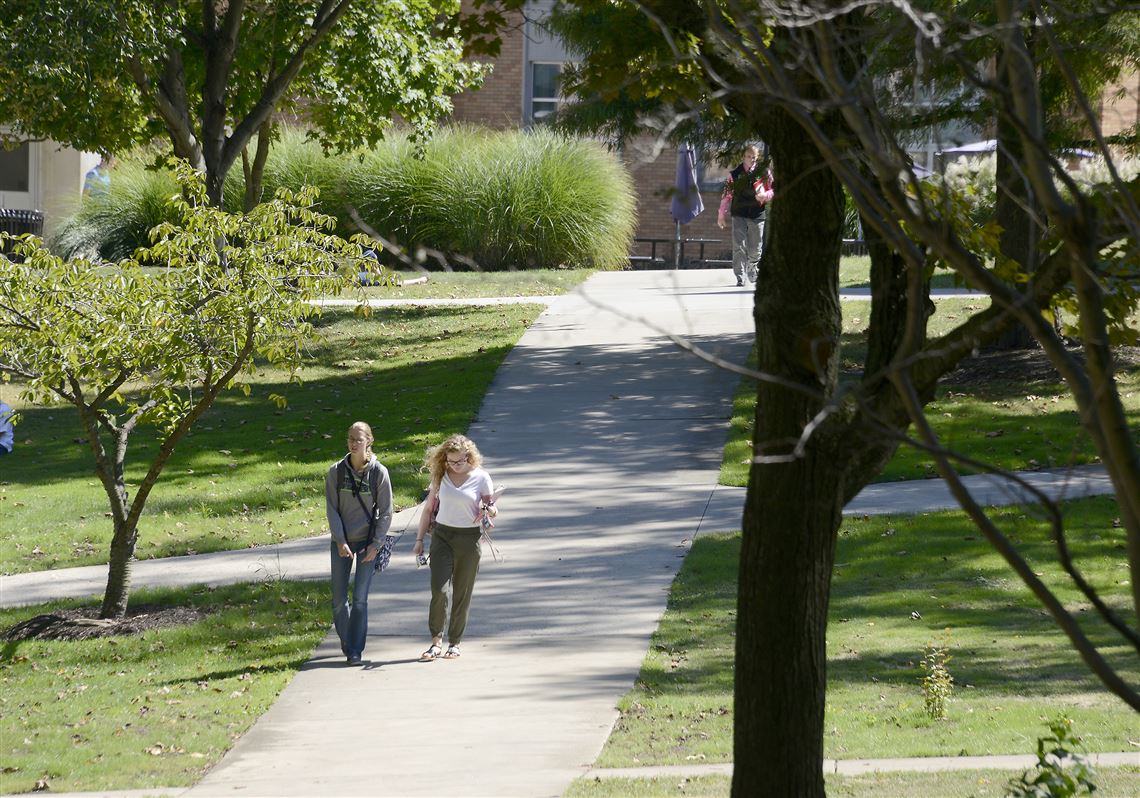 Students cross part of the campus at Geneva College.