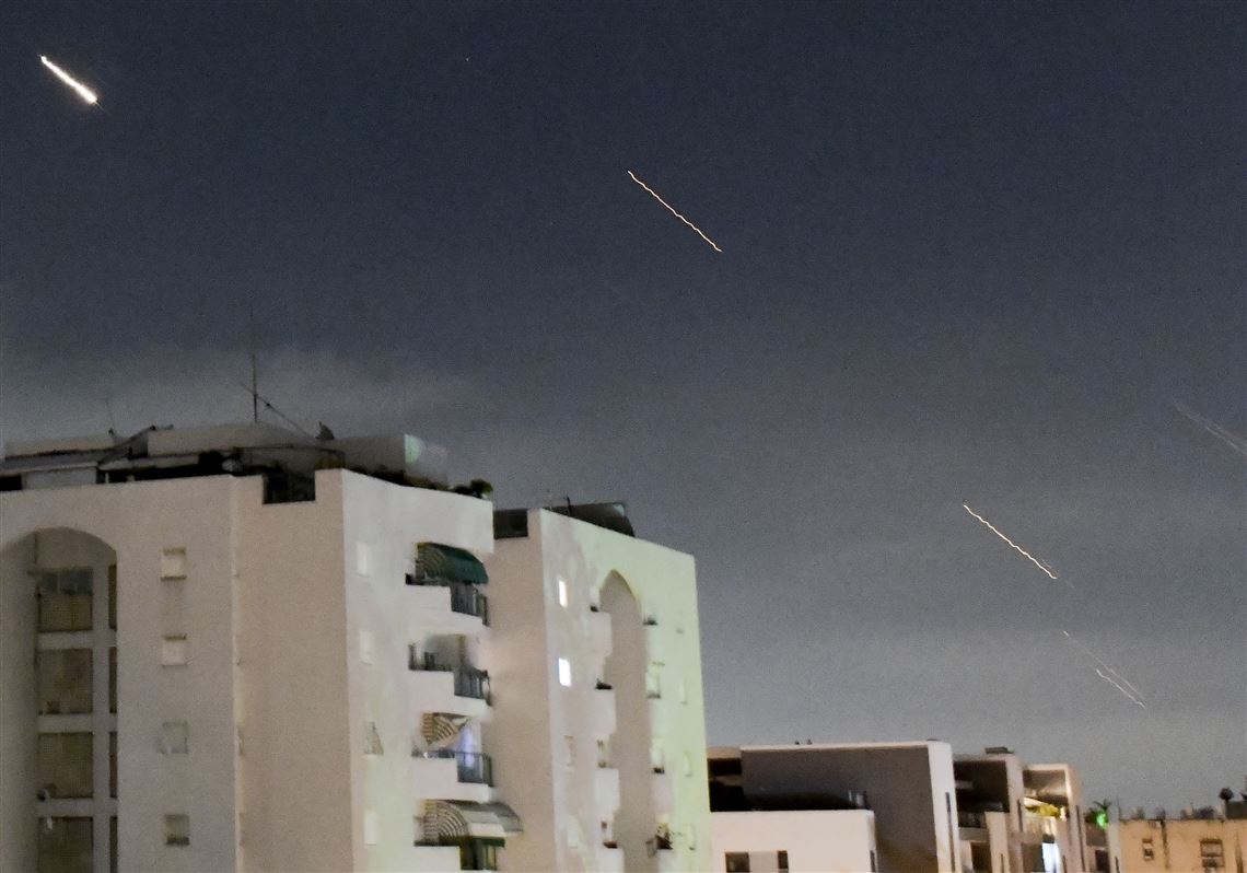 Booms and sirens in Israel after Iran launches over 200 missiles and