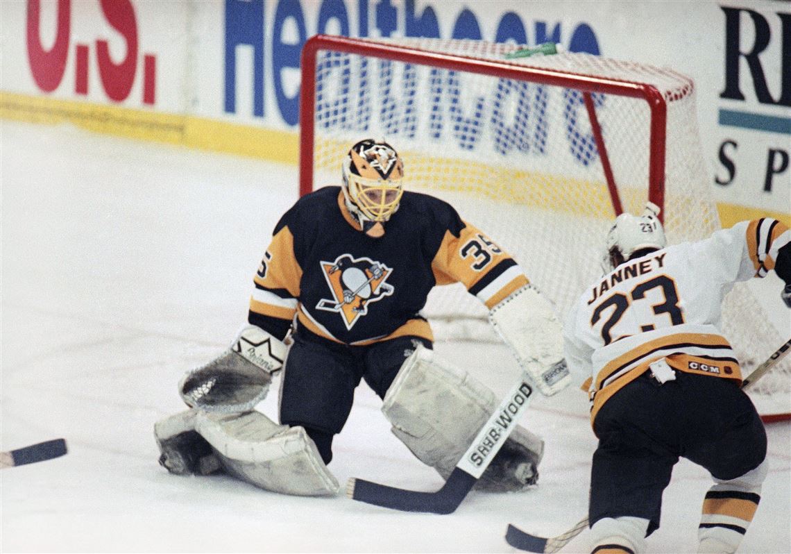 Pitsburgh Penguins goaltender Tom Barrasso stands in his net with