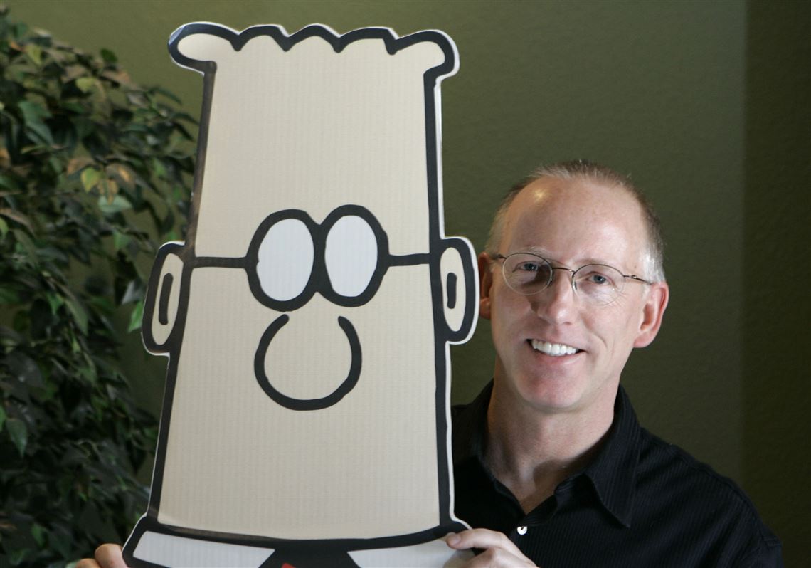 Scott Adams, creator of the comic strip "Dilbert," poses for a portrait with the Dilbert character in his studio in Dublin, Calif. on Oct. 26, 2006.