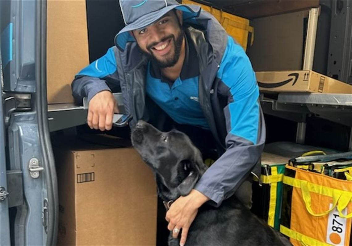 Some dogs love their delivery people — even ones without treats