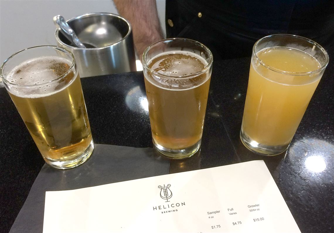 Three 4-ounce sampler glasses of the first beers at Helicon Brewing Co. in Oakdale: From left, Hellen Lager, American Pale Ale 001 and India Pale Ale 002 -- the latter two being the first and second beers ever brewed on Helicon's system. 