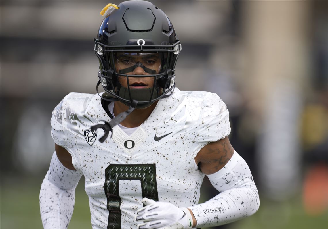 Oregon defensive back Christian Gonzalez runs a drill at the NFL