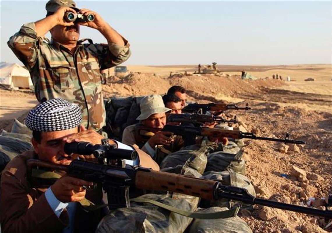 Kurdish peshmerga fighting the Islamic State in Iraq