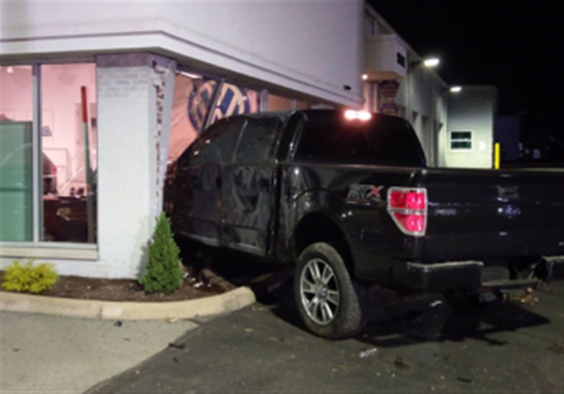 Truck crashes into car dealership showroom in Greensburg Pittsburgh