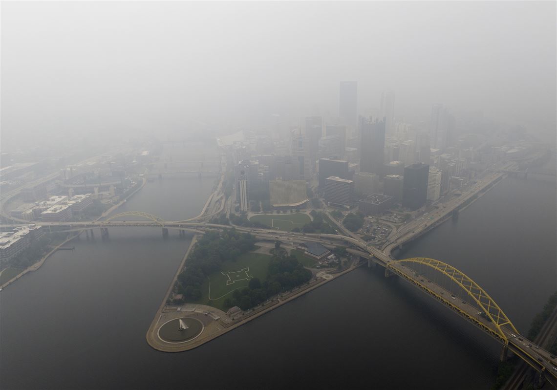 Downtown Pittsburgh seen through smoke from Canadian wildfires in late June.