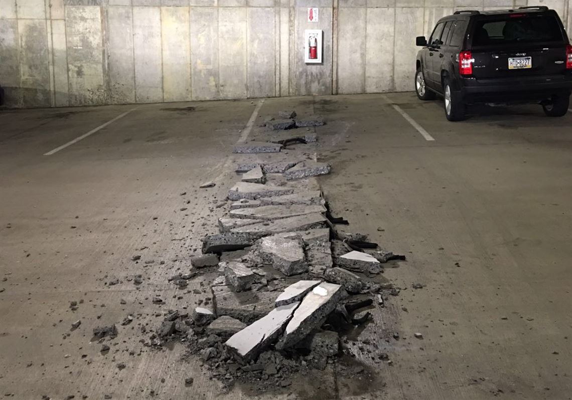 This photo obtained by the Pittsburgh Post-Gazette under a Right to Know request shows concrete that collapsed onto the first floor of the parking garage at California University of Pennsylvania. The collapse occurred in August 2016. 