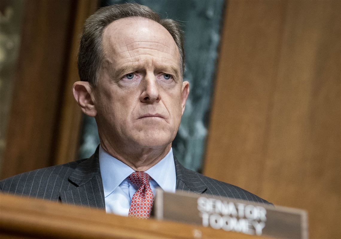 Sen. Pat Toomey, R-Pa.dur­ing a Con­gres­sio­nal Over­sight Com­mis­sion hear­ing on Cap­i­tol Hill in Wash­ing­ton.