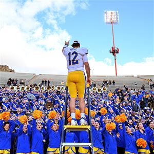 Tony the Tiger Sun Bowl merchandise on sale before UCLA vs Pitt game