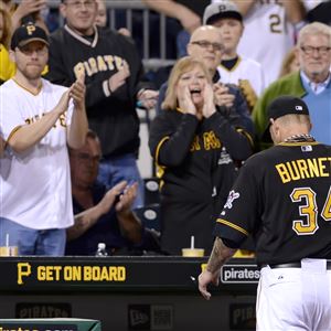 Pirates' pitcher A.J. Burnett acknowledges the crowd as he's pulled from the game in the seventh inning against the Tigers at PNC Park. 