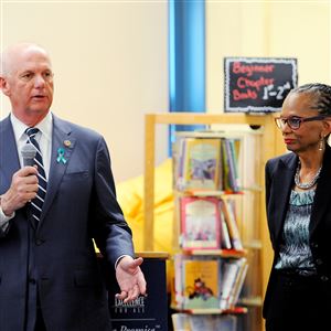 David J. Hickton, U.S. attorney for the Western District of Pennsylvania, speaks Wednesday at Pittsburgh Minadeo PreK-5. At right is Linda Lane, Pittsburgh Public Schools superintendent.