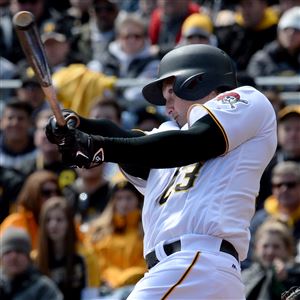 The Pirates' David Freese hits a single in the first inning against the Cardinals Sunday at PNC Park. 