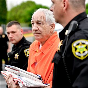 Former Penn State University assistant football coach Jerry Sandusky arrives at the Centre County Courthouse in May. 