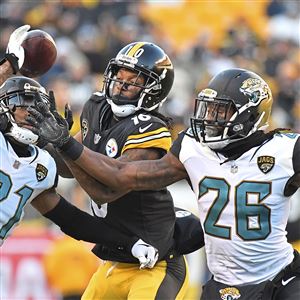 Jaguars stun Steelers 45-42 to earn trip to AFC title game, Photos